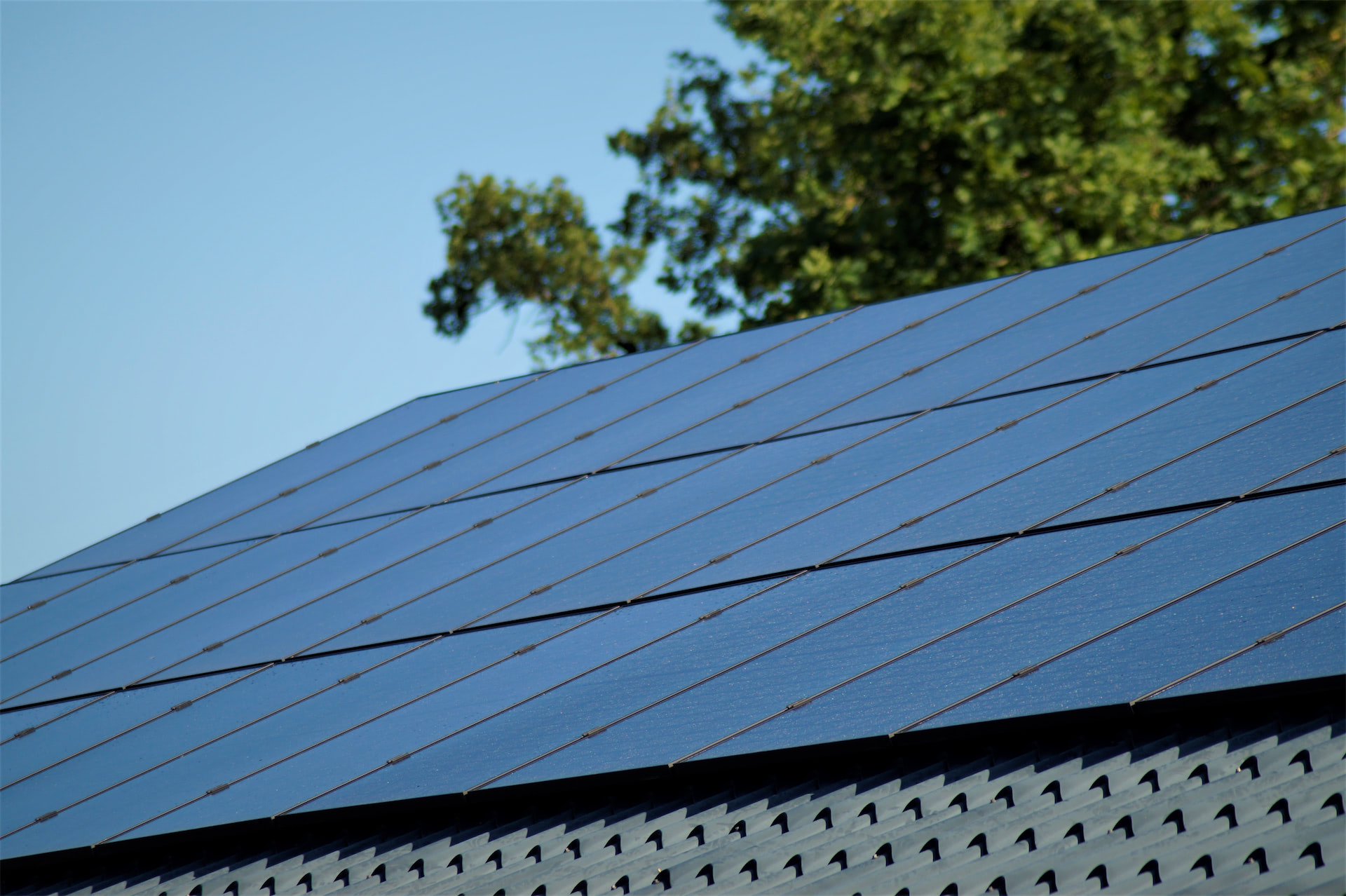 Solarpanels at roof of Patient Lifting Solutions building where ceiling hoists are made